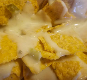 photo of chips with queso on them